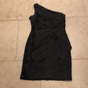 Black cocktail dress. One shoulder/strapless top with ruffles